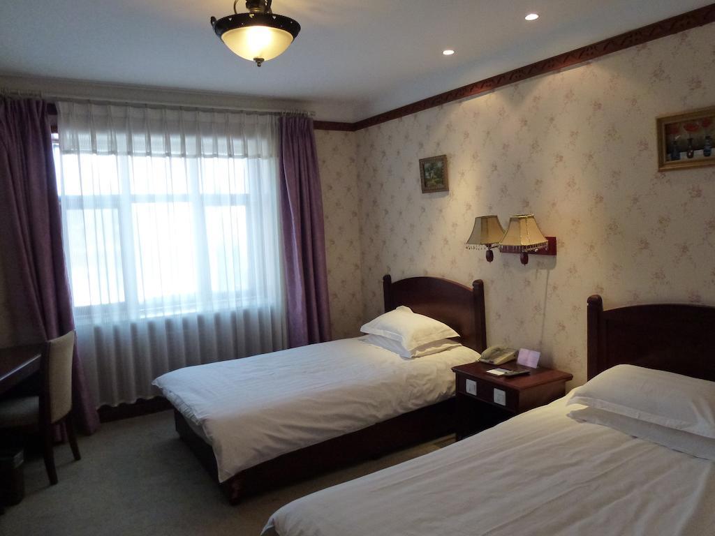 Harbin Volgamanor Hotell Acheng Rom bilde