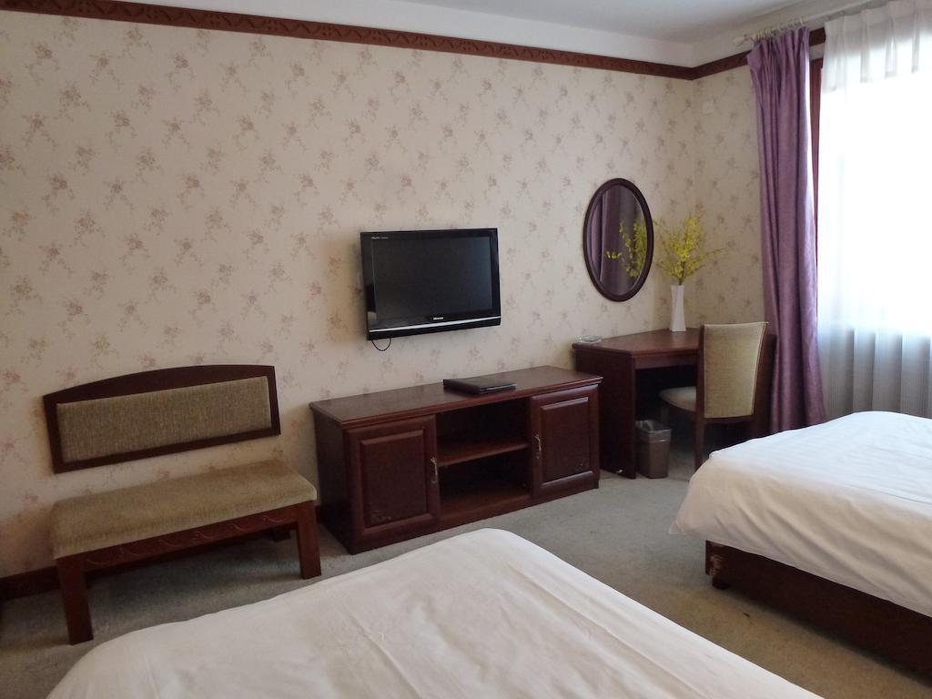 Harbin Volgamanor Hotell Acheng Rom bilde