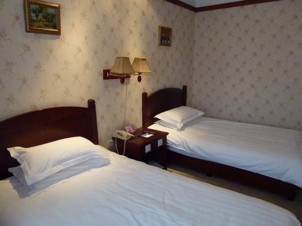 Harbin Volgamanor Hotell Acheng Rom bilde