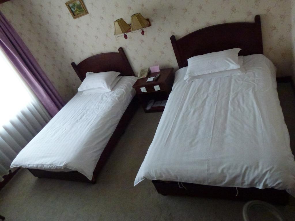 Harbin Volgamanor Hotell Acheng Rom bilde