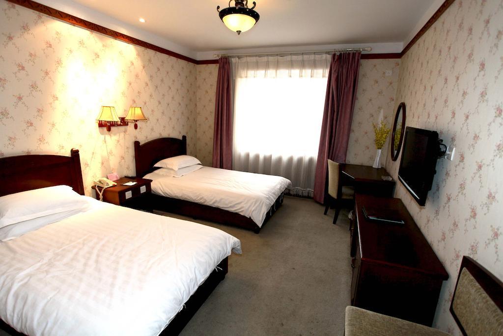 Harbin Volgamanor Hotell Acheng Rom bilde