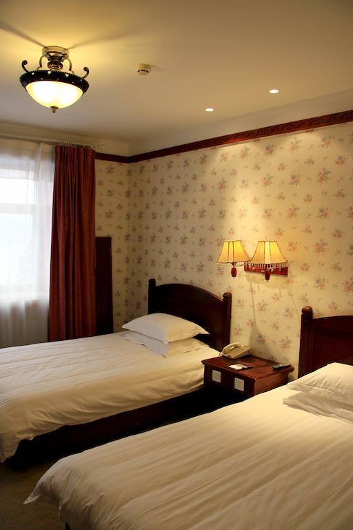 Harbin Volgamanor Hotell Acheng Rom bilde